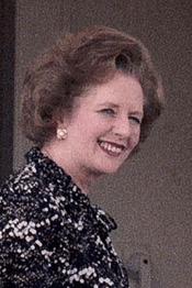 Photograph of Margaret Thatcher in front of the Union Jack
